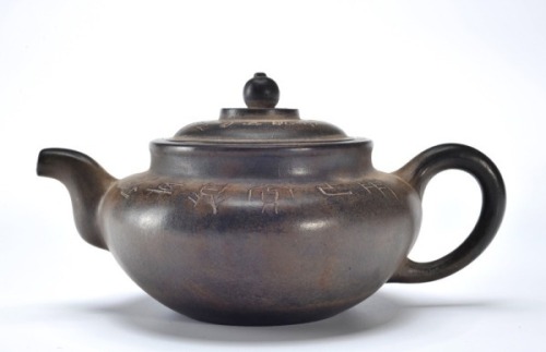 A Yixing Glazed Teapot