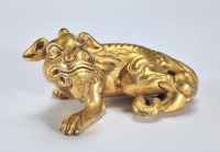 A Gilt-bronze Beast