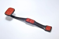 A Carved Cinnabar Lacquer Ruyi Scepter