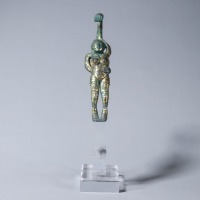 A Silver and Gold Inlaid Figural Belt-hook