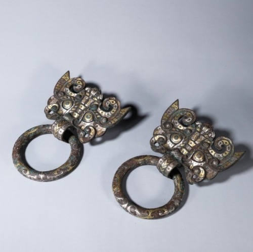 A Silver and Gold Inlaid Ornaments