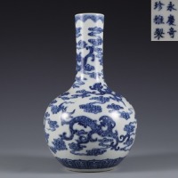 A Blue and White Dragon and Cloud Vase