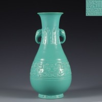 A Green Glazed Moulded Vase