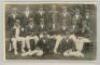 Australia tour to England 1921. Mono newspaper cutting image of the Australian touring party seated and standing in rows wearing tour caps and blazers. The image boldly signed in black in by Warwick Armstrong, Captain. Approx. 6.5"x4", laid to board. G - 