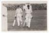 Scarborough Cricket Festival 1936. Yorkshire v M.C.C., 2nd- 4th September 1936. Mono real photograph postcard of Wilcox and Price walking out to bat for M.C.C., the grandstand in the background. Stamp for Walkers Studio, Scarborough, to verso. VG - cricke