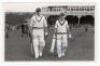 Scarborough Cricket Festival 1952. Gentlemen v Players, 6th- 9th September 1952. Mono real photograph plain back postcard of Fletcher and Wilson walking out to bat for the Players. Nicely signed in blue ink to the photograph by Dave Fletcher. Stamp for Wa