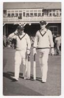 Scarborough Cricket Festival 1953. T.N. Pearce's XI v Australians, 9th- 11th September 1953. Mono real photograph plain back postcard of Arthur Morris and Graham Hole walking out to bat for the Australians. Assumed to be by Walkers Studio, Scarborough. VG