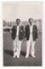 Scarborough Cricket Festival 1955. Yorkshire v M.C.C., 31st August- 2nd September 1955. Mono real photograph plain back postcard of Trevor Bailey and Doug Insole of the M.C.C. team standing side by side wearing cricket attire and blazers, the pavilion in 