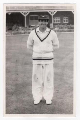 Scarborough Cricket Festival 1957. Mono real photograph plain back postcard of Fred Trueman standing full length wearing cricket attire and Yorkshire cap, the pavilion in the background. Assumed to be by Walkers Studio, Scarborough. VG - cricket
