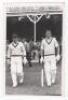 Scarborough Cricket Festival 1965. South Africa. Mono real photograph plain back postcard of Denis Lindsay and Dennis Gamsy walking out to bat for the South Africans in the match v T.N. Pearce's XI, 4th- 6th September 1965. Stamp for Walkers Studio, Scarb