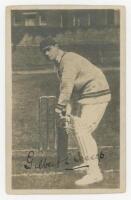 Gilbert Laird Jessop, Gloucestershire & England 1894-1914. Mono postcard of Jessop, full length, in distinctive crouched batting pose with unorthodox grip. The postcard nicely signed to image in black ink by Jessop. The Ideal London Studios, Hammersmith. 