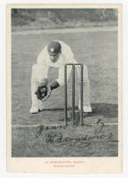 Herbert Strudwick. Surrey & England 1902-1927. Mono postcard of Strudwick in wicket keeping pose. Nicely signed in black ink to the image by Strudwick. Publisher unknown. Uneven trimming to lower edge, small adhesive marks to verso, otherwise in good cond