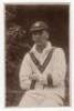Joe Hardstaff Jnr. Nottinghamshire & England 1930-1955. Sepia real photograph postcard of Hardstaff seated three quarter length wearing cricket attire and Nottinghamshire cap. C.H. Richards series, c1932. Very good condition - cricket