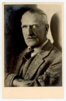 Sir Charles Aubrey Smith. Mono plain back real photograph postcard of Smith in later years. Nicely signed in black ink 'C. Aubrey Smith' to the photograph. Minor silvering, adhesive marks to verso, otherwise in good/ very good condition - cricket