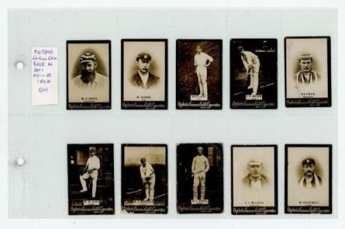 Ogden's Guinea Gold 'Cricketers Base M Large Machette Group' 1899. Twenty cards in total comprising nineteen cards from the set of fifty with 'wide spaced capitals' to players' names, and one from the set of twenty seven 'close spaced'. Wide spaced cards 