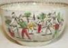 Village cricket bowl. Staffordshire 19th century bowl, transfer printed in sepia with three scenes of village cricket, with church and tents to background, to sides, floral and oak leaf inner rim decoration. Hand coloured in green, burgundy and yellow. Ap - 3