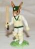 'Test Century Bunnykins'. Handmade and decorated ceramic Bunnykins figure of a batsman with bat raised. Series no. DB272, produced by Royal Doulton 2002 for U.K. International Ceramics Ltd. Limited edition no. 1693 of 2000 pieces made. 4.5" tall. VG - cri