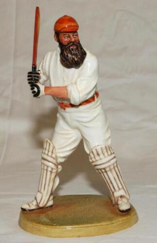 W.G. Grace. Royal Doulton china figure of W.G. Grace. Grace is depicted in batting mode wearing M.C.C. cap with bat raised about to drive. Approx. 9" tall. Limited edition no. 92/9500. Produced in 1995. VG - cricket