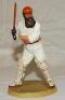 W.G. Grace. Royal Doulton china figure of W.G. Grace. Grace is depicted in batting mode wearing M.C.C. cap with bat raised about to drive. Approx. 9" tall. Limited edition no. 92/9500. Produced in 1995. VG - cricket