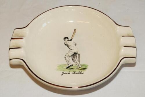 'Jack Hobbs'. Large Sandland Ware ash tray with transfer printed colour image of Hobbs in batting pose to centre, gold lustre to edges. 8.5" wide. Sandland stamp to verso. Minor staining to verso otherwise in very good condition - cricket