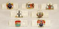 Crested cricket bags. Seven small crested china cricket bags with colour emblems for 'Marlborough'. Arcadian China, 'Castleford'. Carian China, 'Borough of Reading'. Arcadian China, 'Walsingham'. Arcadian China, 'Dulverton' Arcadian China, 'Blackpool' Arc