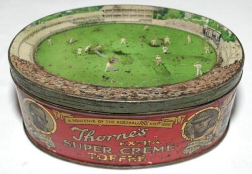 Australia tour of England 1926. An oval colour Thorne's Super Extra Creme Toffee tin 'A Souvenir of the Australian's Visit in 1926'. With named pictures of the Australian team to the sides and portrait of the Oval cricket ground with match being played to