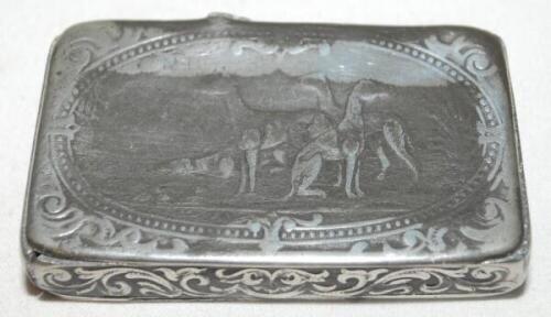 Cricket snuff box mid-1800s. Silver plated snuff box with greyhound scene to lid and cricket scene to base with foliage surround. 3"x1.75". Maker unknown. The silver plate worn, splitting to two corners, breaking to hinge and some denting. Only fair condi