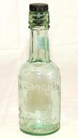 Bramhall Lane Cricket Ground. Attractive cricket green glass beer bottle with stopper c1880/90's with 'E. Donoghue- Wines & Spirits Merchants. Division Street and Bramhall Lane Cricket Ground'. 8.5" tall. G - cricket