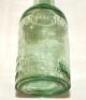 Bramhall Lane Cricket Ground. Attractive cricket green glass beer bottle with stopper c1880/90's with 'E. Donoghue- Wines & Spirits Merchants. Division Street and Bramhall Lane Cricket Ground'. 8.5" tall. G - cricket - 2
