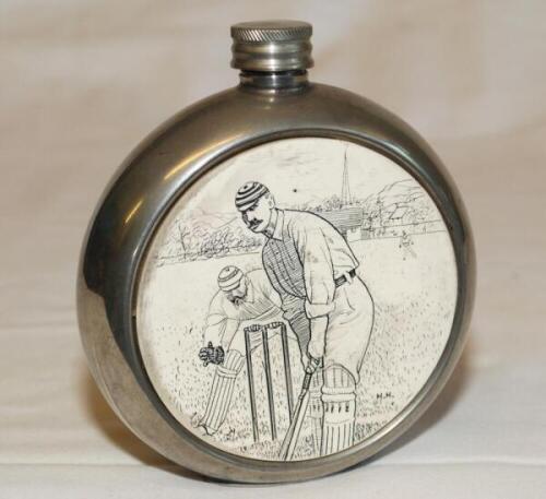 Cricket hip flask. Circular pewter hip flask with cricket scene to centre of batsman and wicketkeeper. Maker's mark for I. & B.W. G., Sheffield, to base. G - cricket