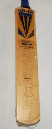 England v Pakistan 1996. Full size Duncan Fearnley 'Cornhill Insurance Test Series 1996' bat signed to the face by thirteen members of the England team and sixteen members of the Pakistan touring party. Signatures include Atherton, Stewart, Ealham, Thorpe