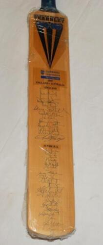 England v Australia 1997. Full size Duncan Fearnley 'Cornhill Insurance Test Series 1997' bat signed to the face by twelve members of the England team and seventeen members of the Australian touring party. Signatures include Atherton, Hussain, Stewart, Th