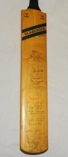 India tour to England 1971. Full size Slazenger bat signed to the face by thirteen members of the Indian touring party, and fifteen members of the Surrey County Championship winning side of 1971. Also signed to the verso by Yorkshire (thirteen signatures)