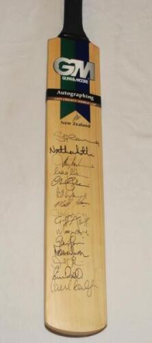 Cricket World Cup 1999. New Zealand. Full size Gunn & Moore official 'Autographing' bat signed by fifteen members of the New Zealand squad, some in thicker pen. Signatures include Fleming, Astle, Cairns, Parore, Horne, Allott, Hart, Nash, Doull etc. VG -