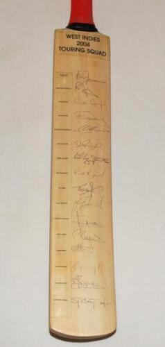 West Indies tour to England 2004. Full size bat with printed title label to top and players' name label to side. Nicely signed by all sixteen listed members of the touring party. Signatures include Lara (Captain), Sarwan, Gayle, Chanderpaul, Jacobs, Rampa