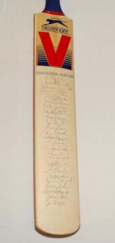 Gehan Mendis. Lancashire. Benefit year 1993. Full size Slazenger 'V' bat nicely signed to the face by twenty five Lancashire players. Signatures include Fairbrother, Atherton, Mendis, Watkinson, Fletcher, Fielding, Stanworth, Derbyshire, G. Lloyd, Barnett