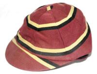 Harold William Warner. Cricket collector, Kent cricket enthusiast and author of cricket books. Hooped maroon, gold and black cricket cap, by 'Charles Mattocks & Son of Canterbury'. 'H.W. Warner' handwritten to label in cap. Good condition - cricket