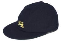 Bruce French. Nottinghamshire & England. Navy blue cloth cap with England lion emblem embroidered to front. Issued to French on the 1978 U-19 series against West Indies. Signed by French to the inside label. Includes compliment slip signed by French descr