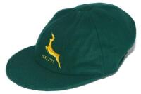 Nottinghamshire green woollen cap with later (c. 2010) embroidered leaping stag emblem to front and 'Notts' below. Player unknown. G/VG - cricket