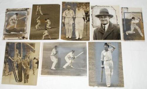 Don Bradman. Australia tours to England 1930 and 1934. Sixteen original mono press photographs, the majority featuring Bradman in batting action during the 1930 and 1934 tours, one of Bradman head and shoulders wearing overcoat and trilby hat, a further h