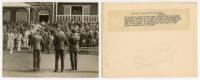 Australia tour to England 1934. Original mono press photograph of the Australian team being booed as they are coming out to field in the tour match v Nottinghamshire at Trent Bridge, 11th-14th August 1934. The photograph press caption to verso states 'The