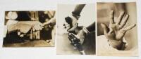 Australian batting grips. Two original mono press photographs depicting close-up images of the hands of two Australian cricketers gripping a bat, one of Jack Gregory, the other Charlie Kelleway. Both images 7.5"x5.5" by Photopress. Sold with a further pho
