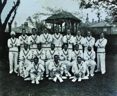 India tour to England 1932. Large official mono photograph of the 'All-India Cricket Team 1932', seated and standing in rows, wearing tour cricket attire. The photograph laid down to photographers mount and signed in black ink to the image by all eighteen