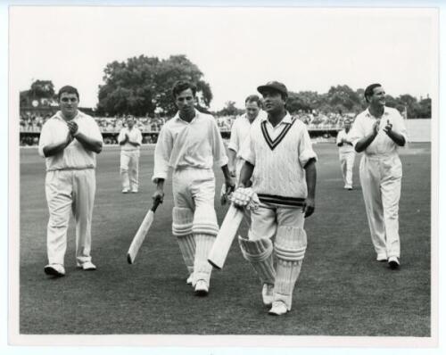 England v Pakistan 1967. Two original mono press photographs featuring Hanif Mohammad and Asif Iqbal of Pakistan in the first Test at Lord's, 27th July- 1st August 1967. One shows the batsmen being applauded off the field by the England players at tea on 