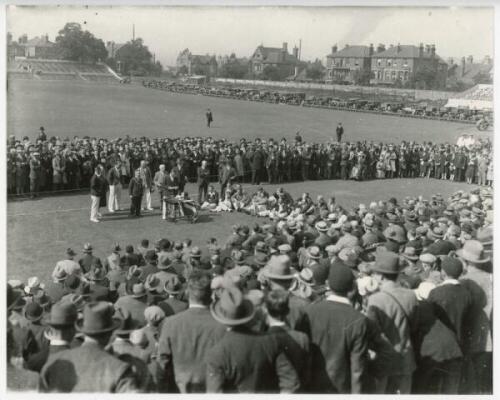 George Gunn. Nottinghamshire & England 1902-1932. Two mono restrike images from originals taken at Trent Bridge of a presentation made to Gunn to celebrate his fiftieth birthday in 1929. One photograph is a general view of the ground with large crowds loo