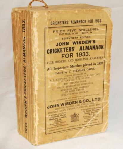 Wisden Cricketers' Almanack 1933. 70th edition. Original paper wrappers. Heavy age toning and wear to wrappers, corner wear with loss to wrappers, nicks to wrapper edges otherwise in good condition - cricket