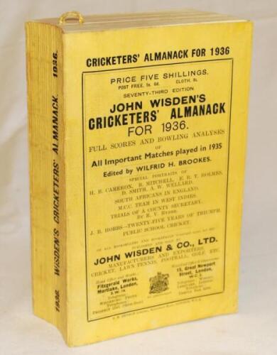 Wisden Cricketers' Almanack 1936. 73rd edition. Original paper wrappers. Bowing to spine, some soiling to page block edge otherwise in very good condition - cricket