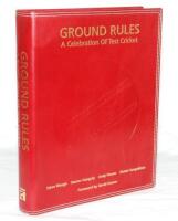 'Ground Rules. A Celebration of Test Cricket'. Edited by Barney Spencer. Dakini Books, London 2003. Bound in full red leather with gilt titles to front cover and spine, large embossed cricket ball emblem to front and white stitching to cover extremities. 