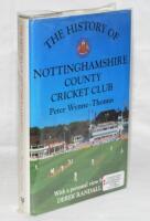 'The History of Nottinghamshire Cricket Club'. Peter Wynne-Thomas. Christopher Helm, London 1992. Profusely signed by Nottinghamshire players dating from 1919-2010s. Includes signatures on pieces, labels and cuttings laid down, and to the pages throughout