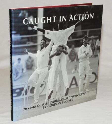 'Caught in Action. 20 Years of West Indies Cricket Photography'. Gordon Brooks. Barbados 2003. Boldy signed to the front endpaper by sixteen members of the 2007 West Indies touring party to England. Signatures include Sarwan, Bravo, Chanderpaul, Collymore